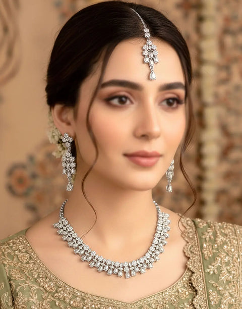 Adorable Zircon Studded Bridal Jewellery Set with Earrings & Tikka
